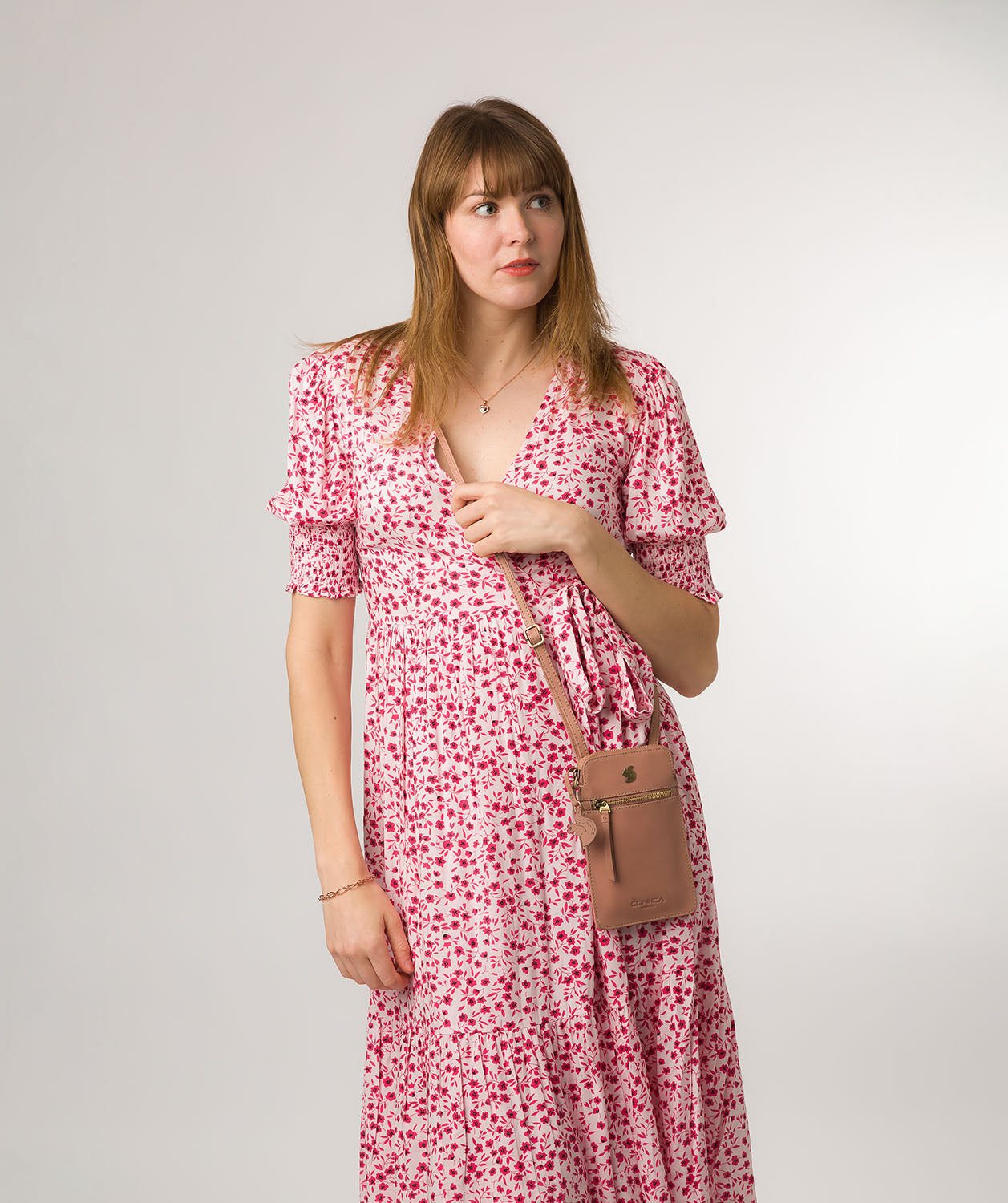 Conkca London Originals Collection Bags: 'Bambino' Subtle Pink Leather Cross Body Phone Bag