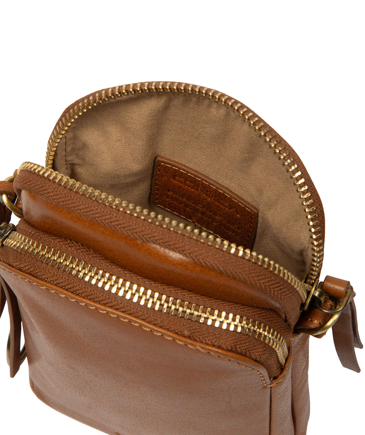 zip-round opening detail on dark tan leather phone bag