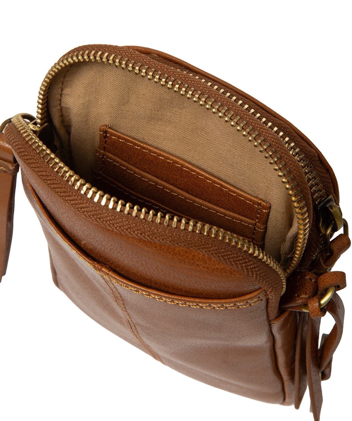 rear slip pocket detail on dark tan leather bag