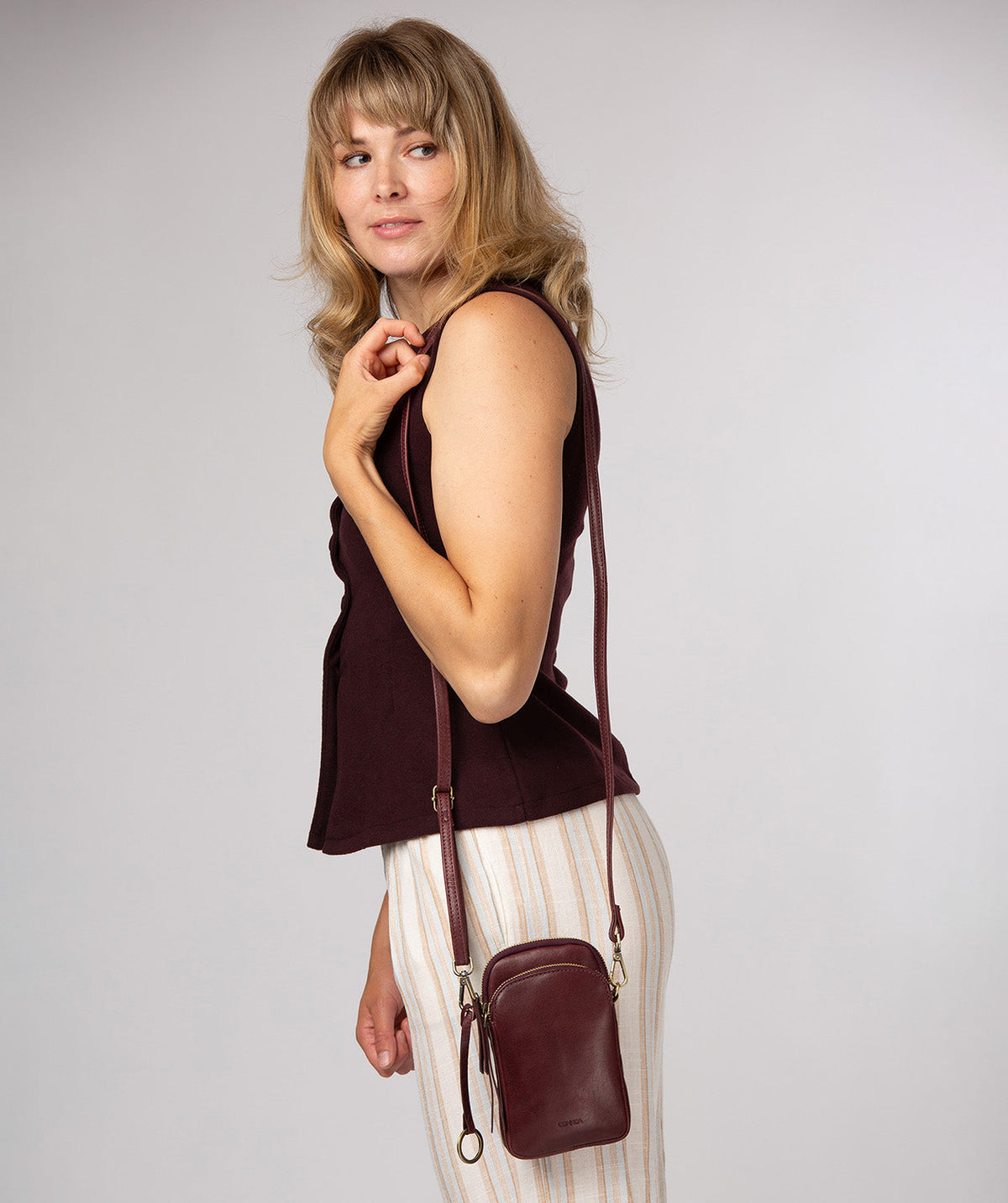 Rear slip pocket and brass zip hardware