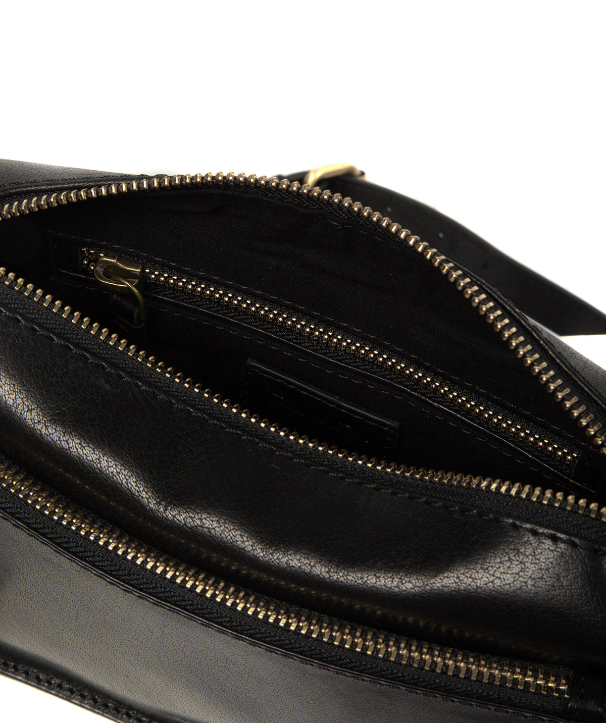 Zipped exterior pocket with brass-coloured hardware