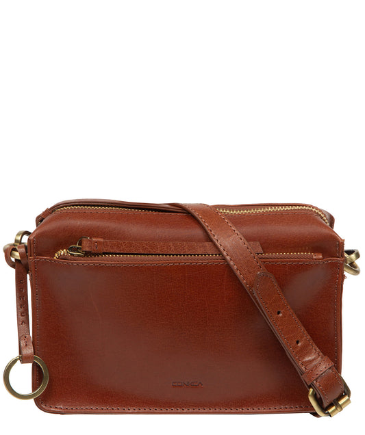 Conkca London Azalea Conker Brown leather crossbody bag front view