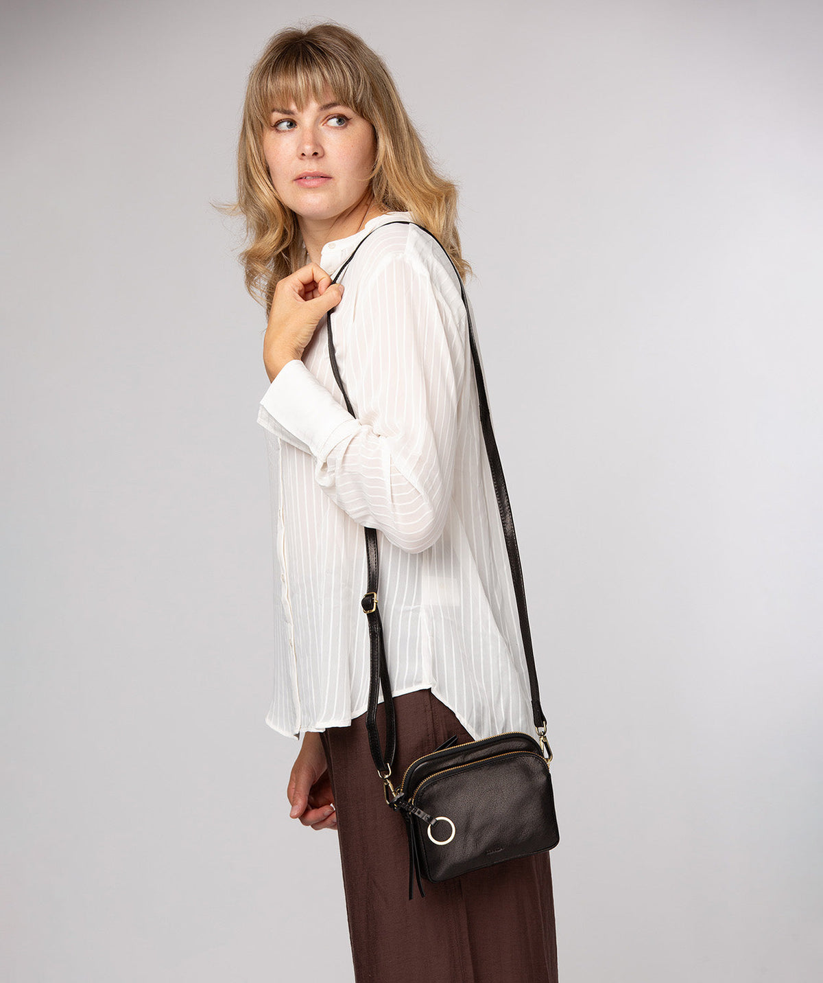 Jay crossbody bag side profile with adjustable shoulder strap