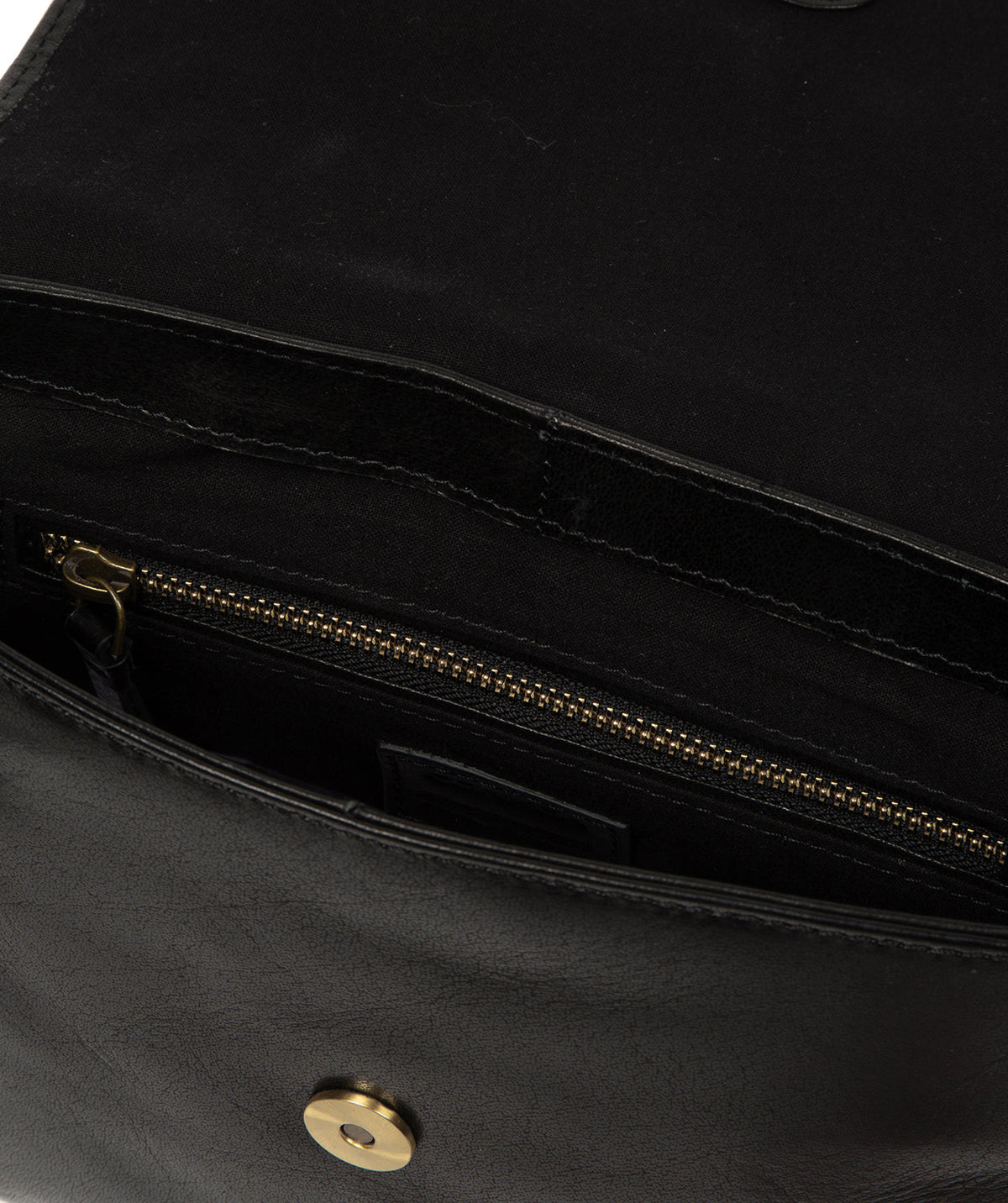 Magnetic press stud closure on fold-over flap
