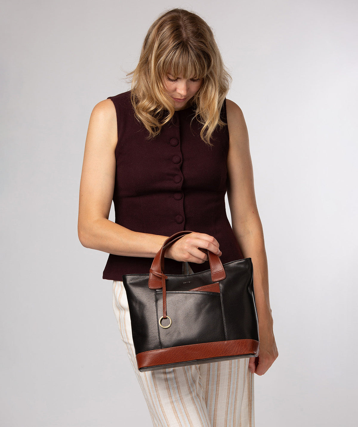 Conkca London Elm black and conker brown leather tote bag front view