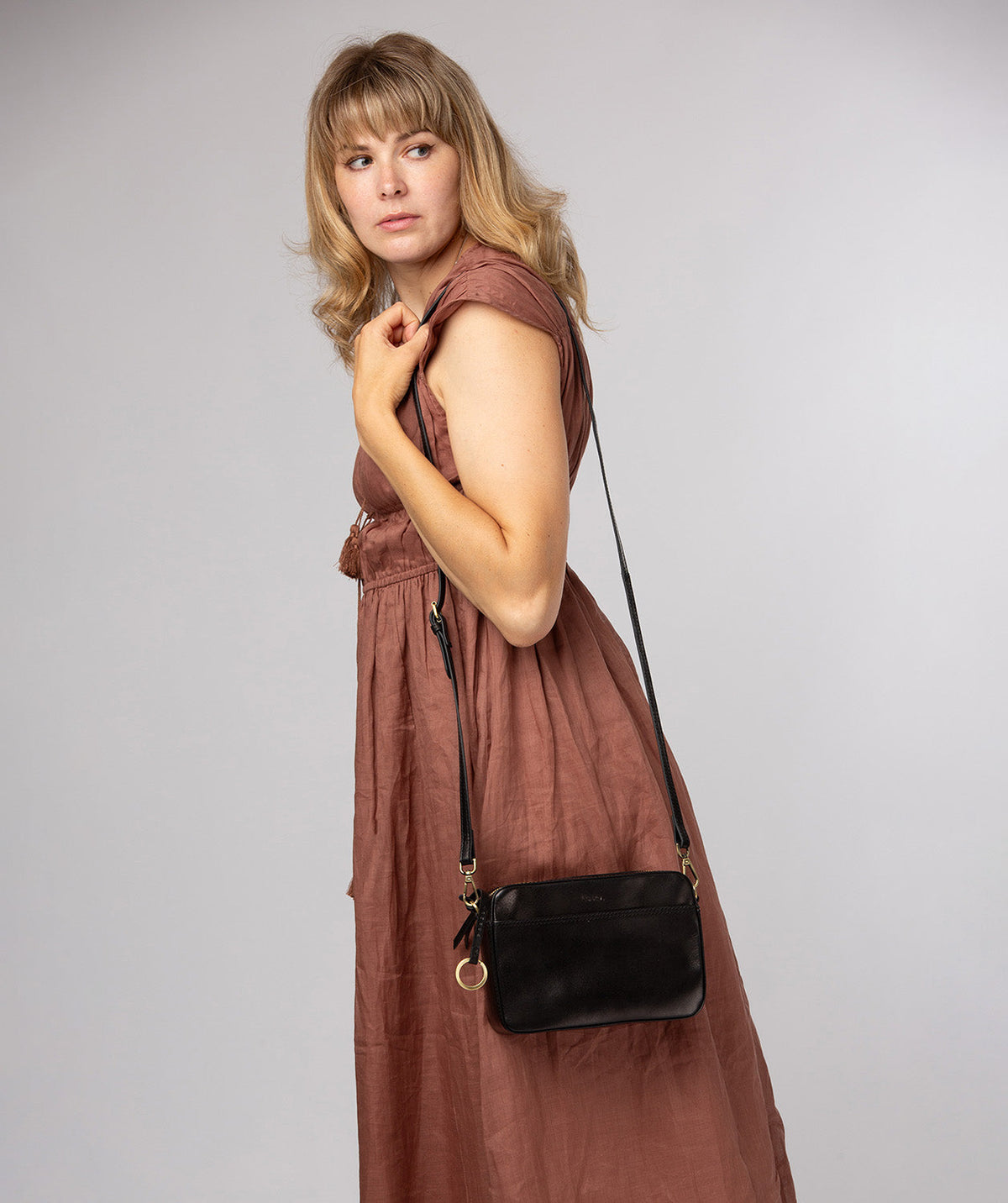 Full bag styling with textured natural leather finish