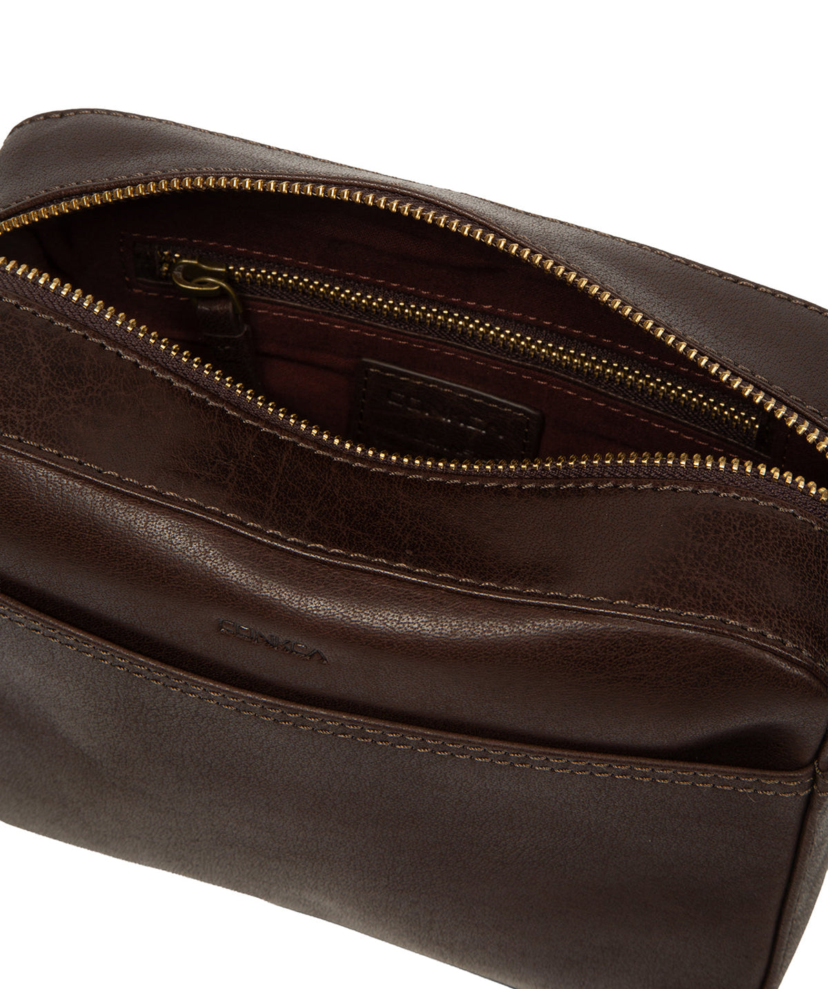 Back exterior slip pocket detail on cocoa leather