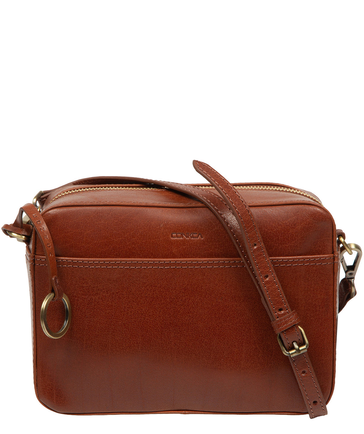 Meadow crossbody bag side profile with brass hardware details