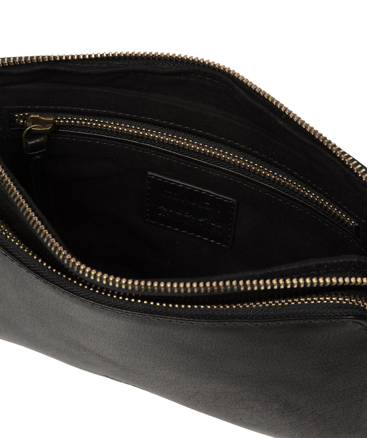 Exterior zipped pocket and brass hardware close-up