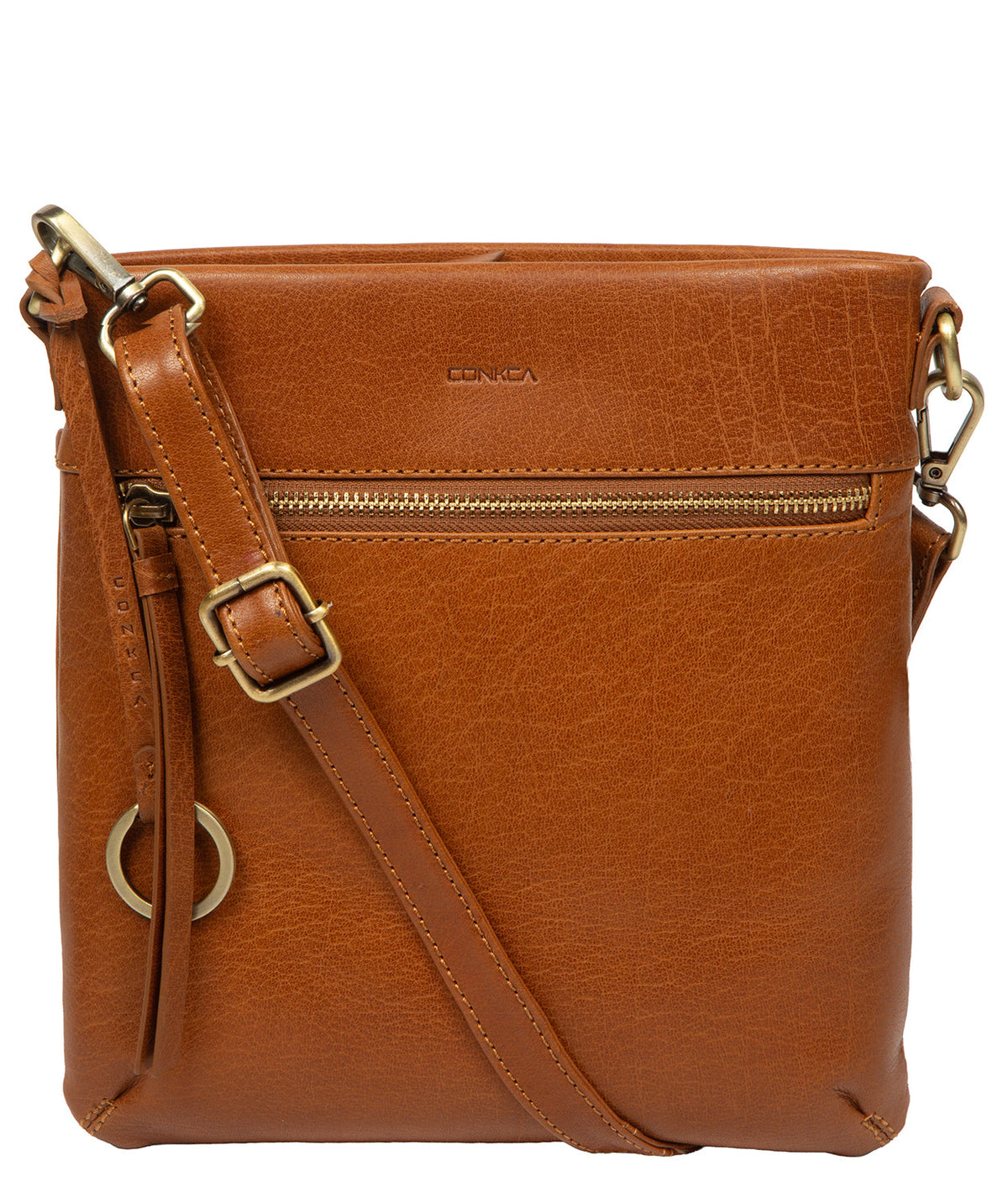 Crossbody bag side profile showing brass hardware and strap