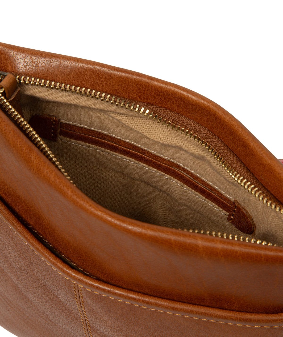 Full crossbody bag styling with natural leather texture