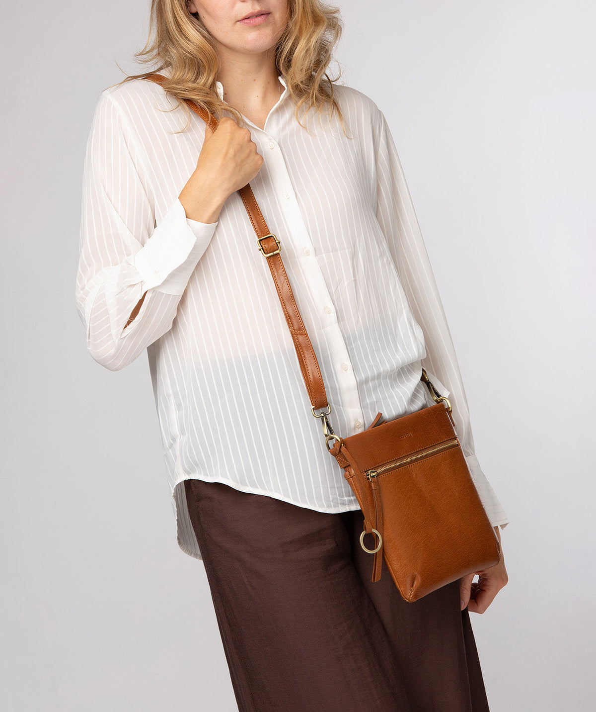 Conkca London Dove dark tan leather crossbody bag front view
