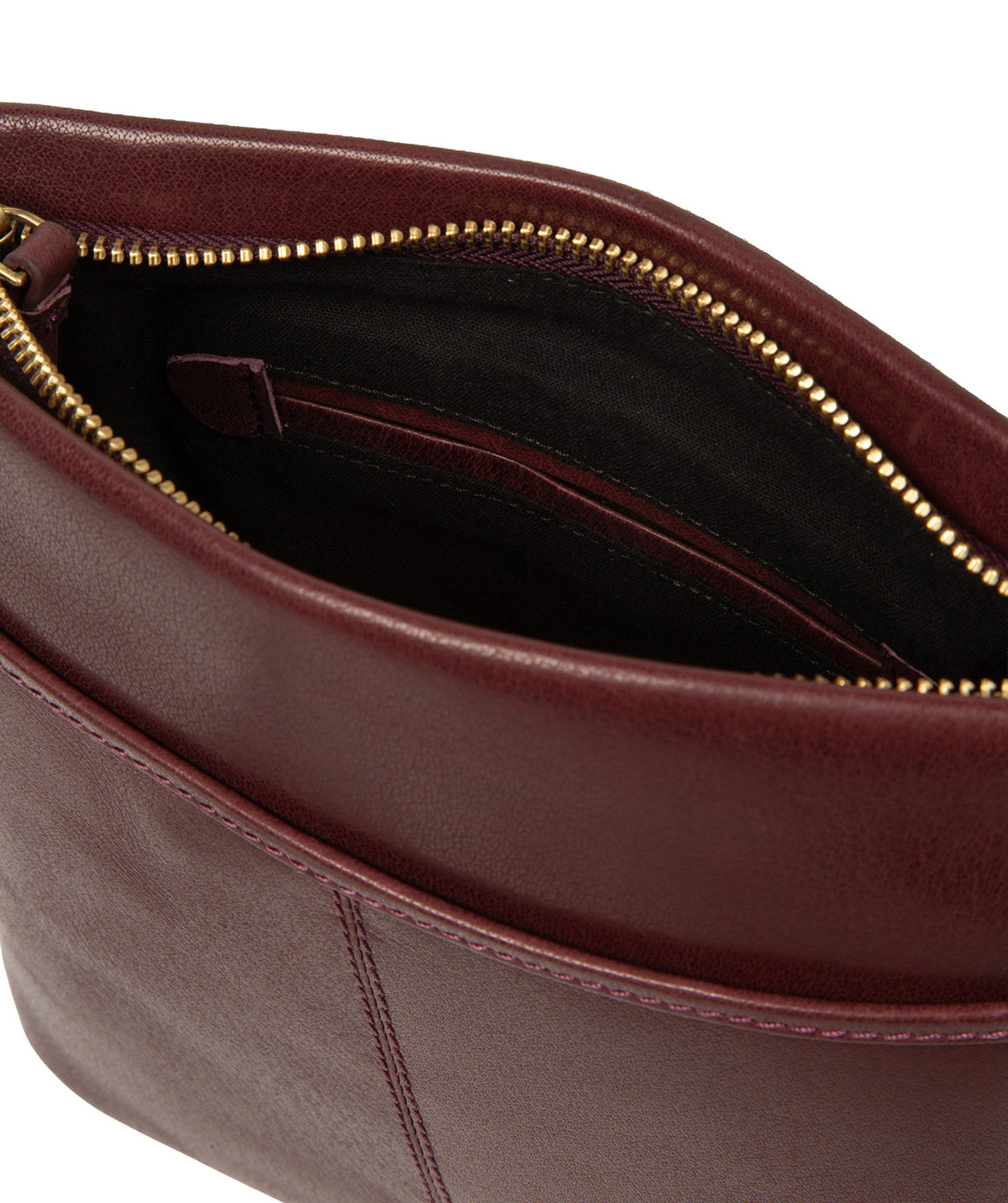 Embossed Conkca logo and minimalist charm detail