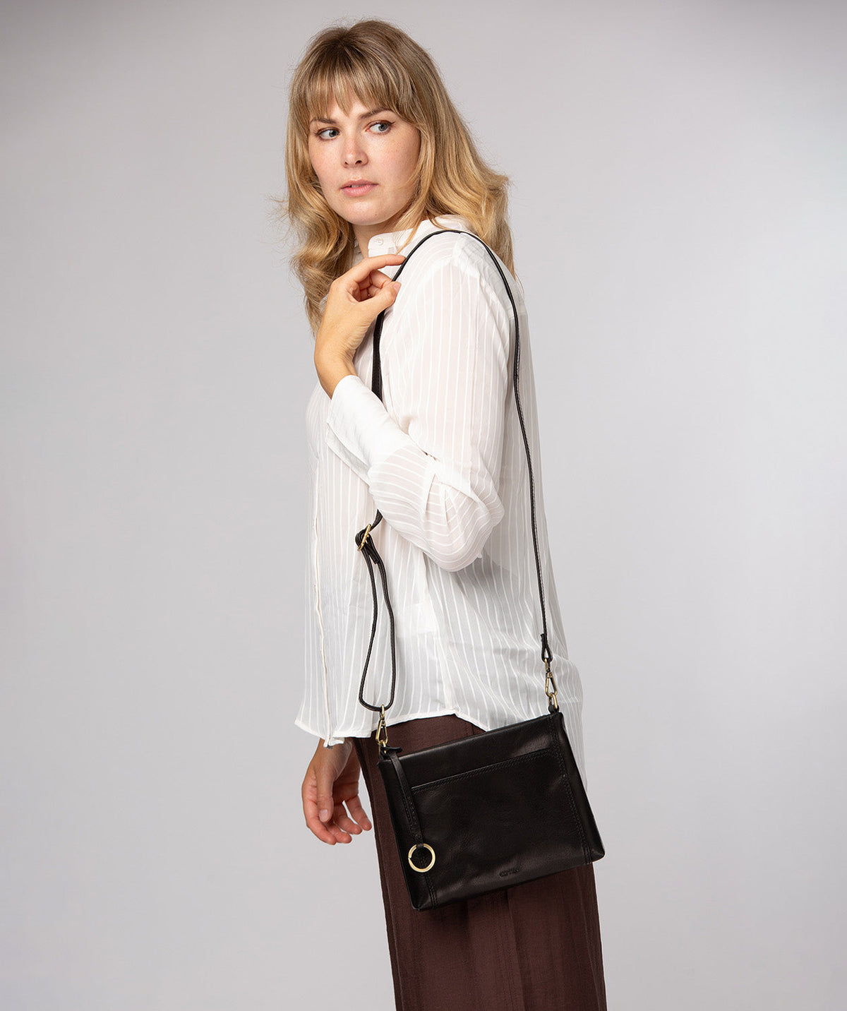 exterior angular slip pockets with brass hardware