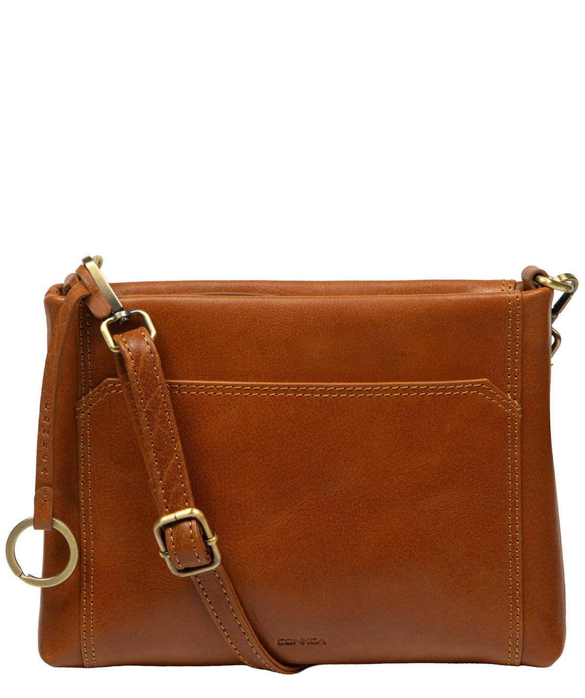 Yew bag side profile showing brass hardware and angular slip pocket