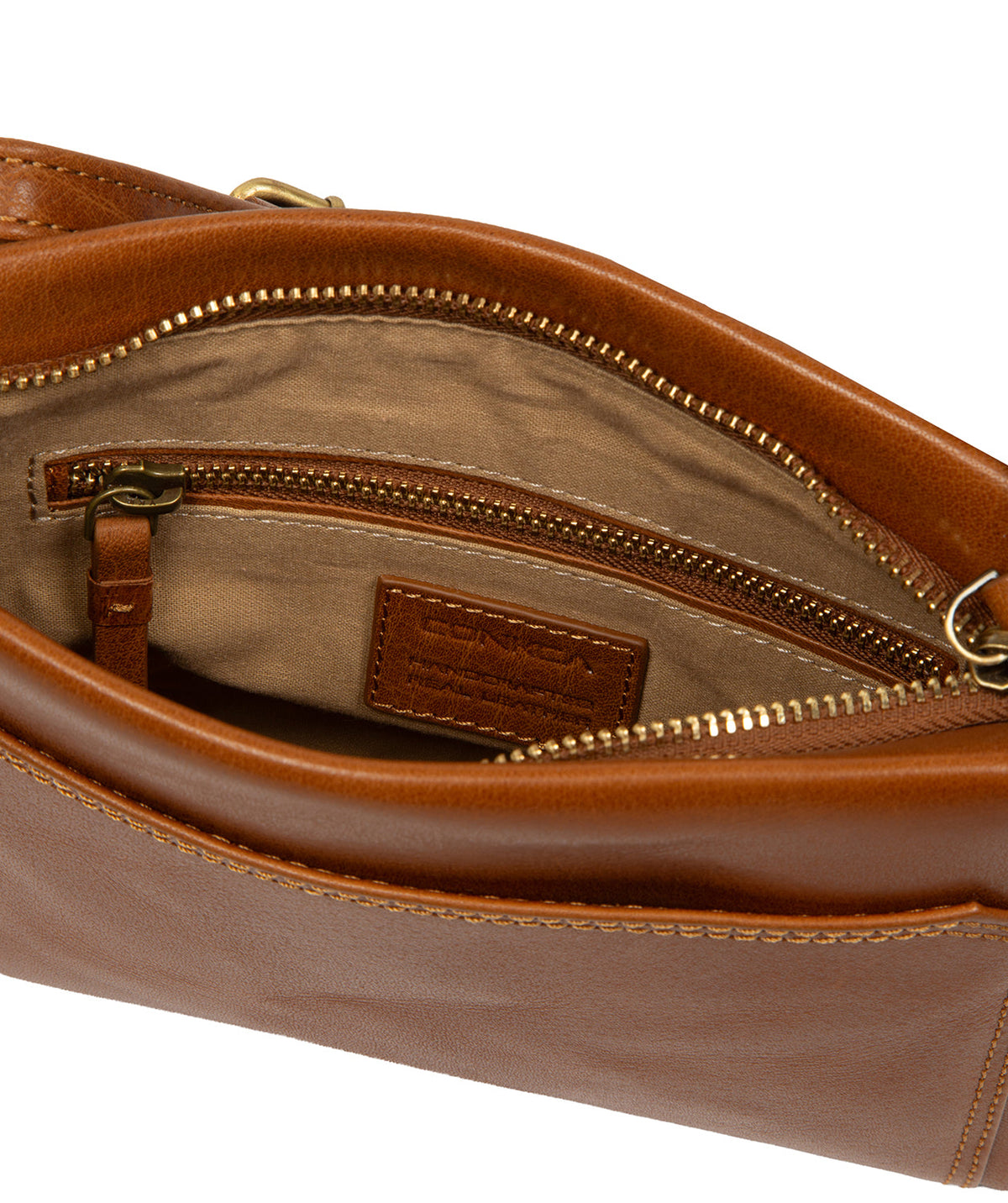 close-up of multi-toned natural leather texture and embossed logo