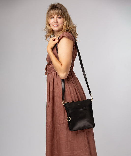 Conkca London Holly black leather crossbody bag front view