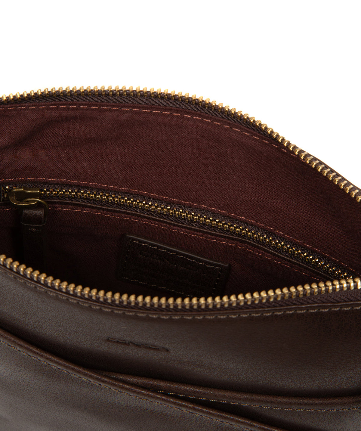 Adjustable leather shoulder strap and brass hardware