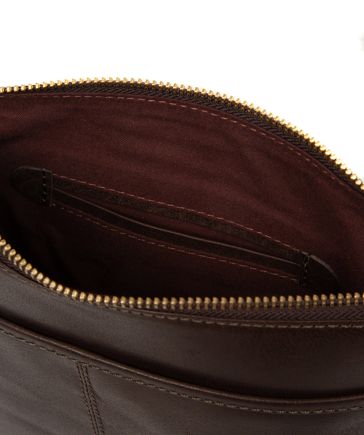 Holly crossbody bag worn on shoulder, styled view