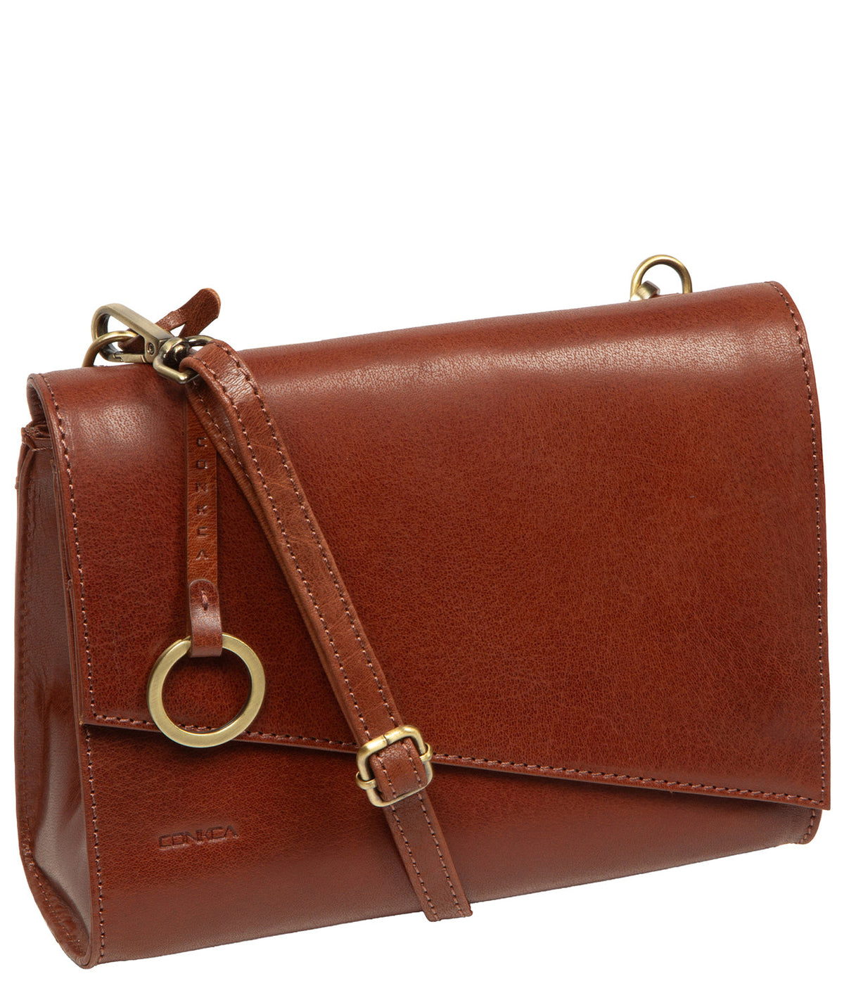 Side profile showing tonal natural leather texture and hardware